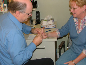 Dr. Hauk at work in the lab with a patient